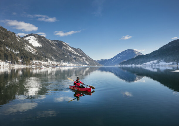     Kayaking in winter at Lake Weissensee 